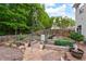 A large garden area with mulched ground cover and many plots, with vegetables, flowers and herbs at 42 Millstone Gln, Dallas, GA 30157