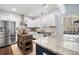 Kitchen showcasing stainless appliances, granite countertops, and ample natural light at 42 Millstone Gln, Dallas, GA 30157
