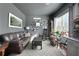 Cozy living room with dark gray walls, decorative accents, and ample natural light at 42 Millstone Gln, Dallas, GA 30157