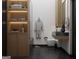 Spa-like bathroom with floating vanity and built-in shelving at 6305 Shannon Pkwy # 202, Union City, GA 30291