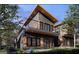 Modern two-story home with gray exterior and wood accents at 6305 Shannon Pkwy # 202, Union City, GA 30291