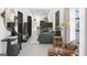 Open concept living area with green sofa and kitchen view at 6305 Shannon Pkwy # 202, Union City, GA 30291