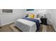 Cozy bedroom with bed, rug, and accent wall is perfect for relaxation at 132 Arnold Pl, Jonesboro, GA 30236