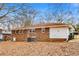 Brick house with a large backyard and detached shed at 132 Arnold Pl, Jonesboro, GA 30236