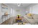 Bright living room featuring neutral colors, modern decor, and comfortable seating at 132 Arnold Pl, Jonesboro, GA 30236