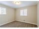 Bright bedroom with neutral walls and carpet flooring at 2848 Baker Ridge Nw Dr, Atlanta, GA 30318