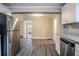 Eat-in kitchen with stainless steel appliances and view to living area at 2848 Baker Ridge Nw Dr, Atlanta, GA 30318