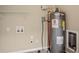 Laundry area with water heater and shelving at 2848 Baker Ridge Nw Dr, Atlanta, GA 30318