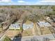 Aerial view of three houses and surrounding area at 2131 Ben Hill Rd, Atlanta, GA 30344