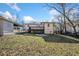 House backyard view with deck and grassy area at 2131 Ben Hill Rd, Atlanta, GA 30344