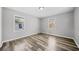 Spacious bedroom with hardwood floors and large windows at 2131 Ben Hill Rd, Atlanta, GA 30344