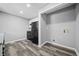 Eat-in kitchen with black appliances and laundry area at 2131 Ben Hill Rd, Atlanta, GA 30344