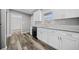 Updated kitchen with white cabinets and black appliances at 2131 Ben Hill Rd, Atlanta, GA 30344