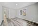 Spacious living room featuring hardwood floors and large windows at 2131 Ben Hill Rd, Atlanta, GA 30344