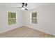 Spacious bedroom with hardwood floors and two large windows at 1167 Key Se Rd, Atlanta, GA 30316