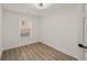 Bright bedroom featuring light wood flooring and large window at 1167 Key Se Rd, Atlanta, GA 30316