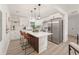 Modern kitchen with white cabinets, stainless steel appliances, and an island at 1167 Key Se Rd, Atlanta, GA 30316