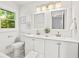 Modern bathroom with double vanity and marble floor at 2905 Gresham Se Rd, Atlanta, GA 30316