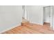 Simple bedroom with wood-look floors and access to stairs at 2905 Gresham Se Rd, Atlanta, GA 30316