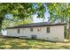 White brick ranch house with a large backyard at 2905 Gresham Se Rd, Atlanta, GA 30316