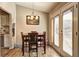 Bright dining area with wood floors and access to backyard at 4162 Samuel Ct, Norcross, GA 30093