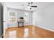 Bright bedroom with hardwood floors and ceiling fan at 805 Abbotts Mill Ct # 74, Duluth, GA 30097