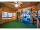 Creative playroom with nature-themed decor and a waterfall backdrop at 1053 Fairway Valley Dr, Woodstock, GA 30189