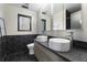 Modern bathroom with double sinks and hexagon tile at 1536 Bullard Rd, Powder Springs, GA 30127