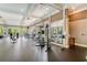 Bright fitness center with various exercise equipment and large windows at 200 River Vista Dr # 330, Atlanta, GA 30339