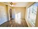 Bright bedroom featuring hardwood floors and large windows at 256 Kings Cv, Locust Grove, GA 30248