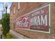 Brick wall with vintage Coca-Cola and Hiram welcome sign at 212 Valerie Cir, Hiram, GA 30141