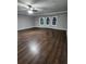 Spacious living room featuring dark hardwood floors and neutral walls at 212 Valerie Cir, Hiram, GA 30141