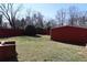 Spacious backyard with red fencing at 1988 Glenmar Dr, Decatur, GA 30032