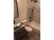 This bathroom features a modern glass sink, a black faucet, and tiled shower with rainfall showerhead at 1988 Glenmar Dr, Decatur, GA 30032