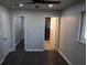Bedroom offering spacious layout, including a walk-in closet and updated paint and flooring at 1988 Glenmar Dr, Decatur, GA 30032