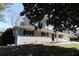 Single-story home featuring a brick exterior and a manicured front yard at 1988 Glenmar Dr, Decatur, GA 30032