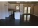 Modern kitchen featuring white cabinets, granite counters, and stainless steel appliances at 1988 Glenmar Dr, Decatur, GA 30032