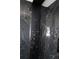 Luxurious shower featuring a marble tile surround, multiple fixtures, and digital controls at 1988 Glenmar Dr, Decatur, GA 30032