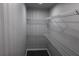 Functional walk-in closet with built in shelving and organization at 1988 Glenmar Dr, Decatur, GA 30032