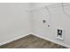 Laundry room with vinyl flooring and overhead shelving at 80 Forray Dr, Covington, GA 30016