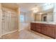 Bathroom boasts a double vanity, soaking tub, and shower at 2149 Baywood Tree Ln, Snellville, GA 30078