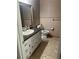 Clean bathroom with updated vanity and tile floors at 6540 Old White Mill Rd, Fairburn, GA 30213