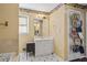 Bathroom with white vanity, black and white tile floor, and a wall-mounted shoe rack at 39 Lambeth Dr, Hiram, GA 30141