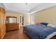 Main bedroom featuring carpet flooring, an ensuite bathroom, and a large wooden dresser at 39 Lambeth Dr, Hiram, GA 30141