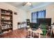 Home office with hardwood floors and built-in shelving at 39 Lambeth Dr, Hiram, GA 30141