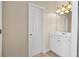 Clean bathroom with white vanity and tile floor at 4095 Northridge Dr, Cumming, GA 30040