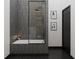 Modern bathroom with gray tile and a glass shower enclosure at 6305 Shannon Pkwy # 112, Union City, GA 30291