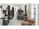 Open concept living room and kitchen with green sofa and modern decor at 6305 Shannon Pkwy # 112, Union City, GA 30291