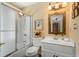 Clean bathroom with shower/tub combo and white vanity at 10170 Cedar Grove Rd, Chattahoochee Hills, GA 30213