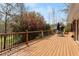 Spacious deck overlooks private backyard with a beautiful view at 10170 Cedar Grove Rd, Chattahoochee Hills, GA 30213